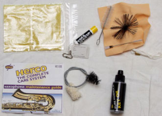 Cork grease, mouthpiece brush, swab, neck cleaner, polishing cloth, duster brush, key oil and ID tag.